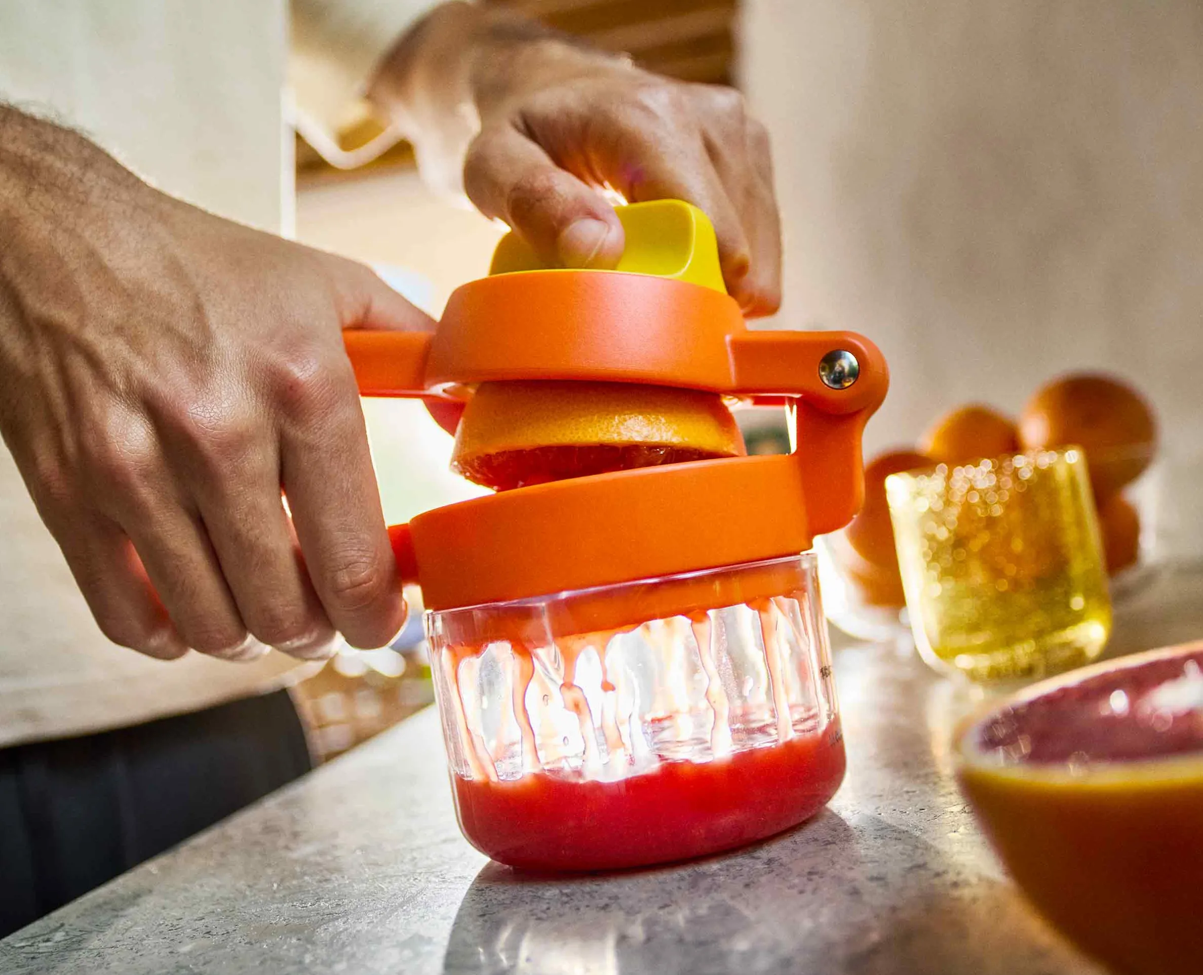 JuiceMax™ Plus Dual-Action Orange Citrus Press with Measuring Cup